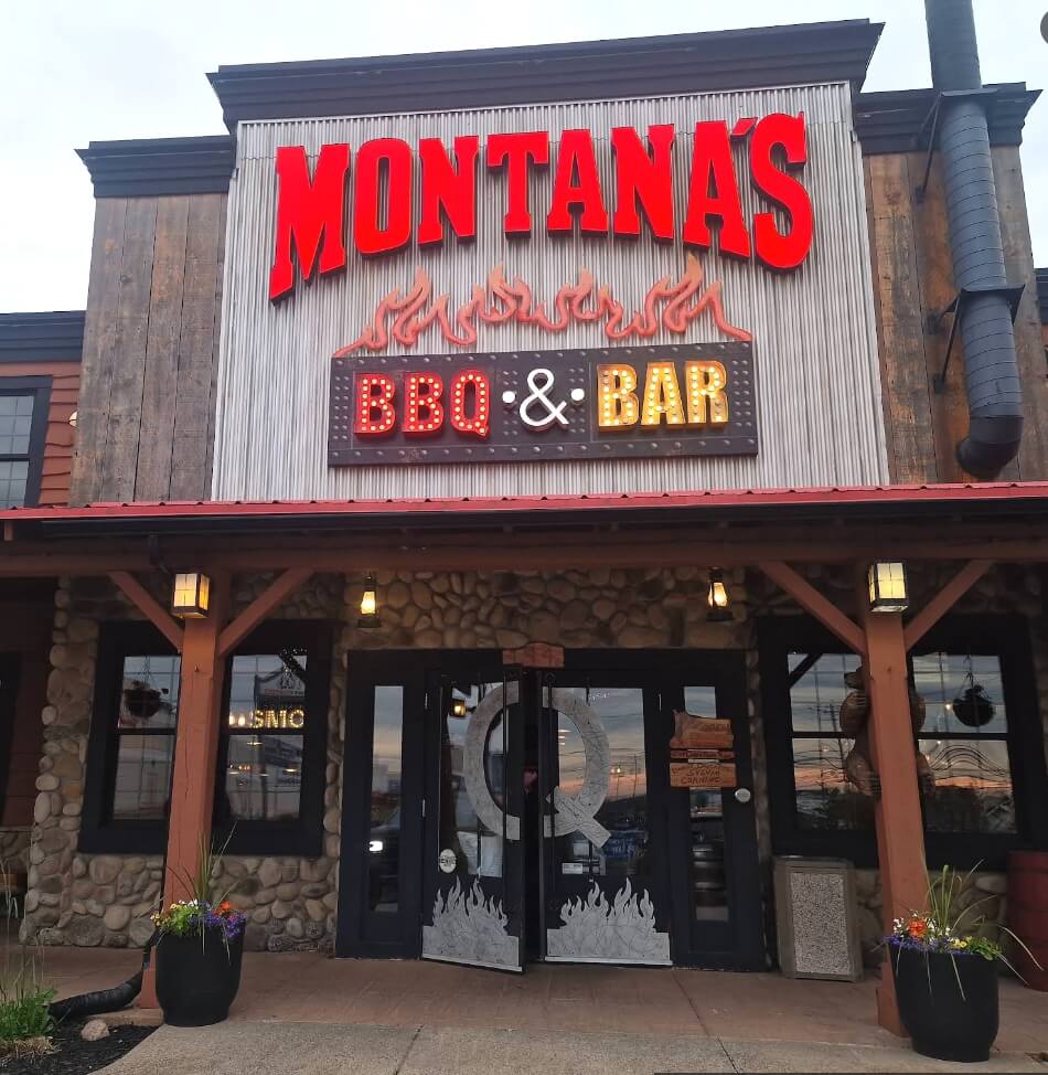 Exterior of Montana’s BBQ &amp; Bar in Halifax, family-friendly restaurant option near glow-in-the-dark mini golf.